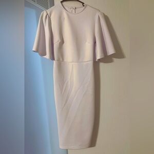 White tight fitting dress with flare like sleeves